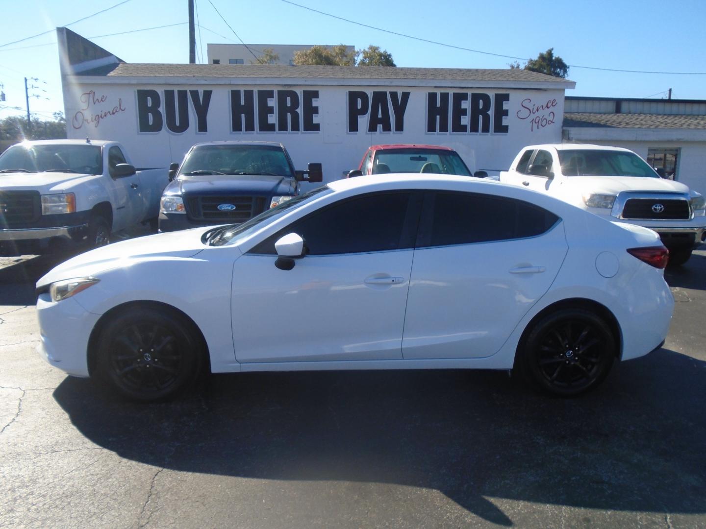 2014 Mazda MAZDA3 (JM1BM1V72E1) , located at 6112 N Florida Avenue, Tampa, FL, 33604, (888) 521-5131, 27.954929, -82.459534 - Photo#0